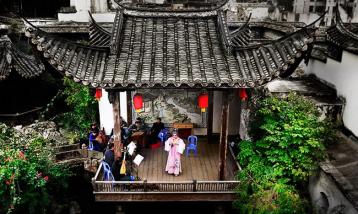 论“水榭戏台”在新中式茶楼中的应用|茶馆设计